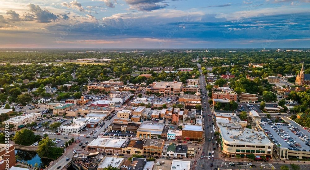 AI generated aerial view of downtown Naperville surrounded by buildings